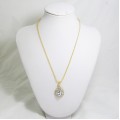 518086 clear in gold pendant