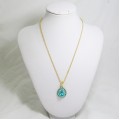 518086 blue in gold pendant